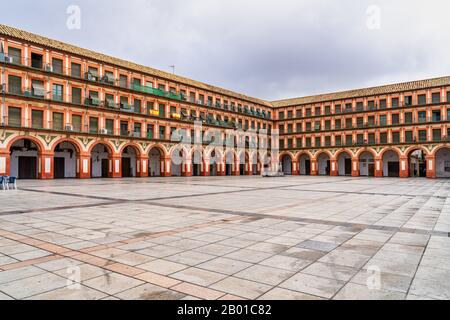 View of famous Corredera Square, Plaza de la Corredera in Cordoba, Spain. XVII century. Plaza de la Corredera is a rectangular square - one of the lar Stock Photo