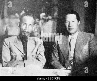 Vietnam: Former Emperor Bao Dai (22 October 1913 - 31 July 1997), shortly after abdicating in 1945 in favour of the Viet Minh, sitting with Ho Chi Minh as a 'simple citizen' and the supreme advisor of the Democratic Republic Of Vietnam. Photo by T. Do Khac, 1 June 1946.  Japan surrendered to the Allies in August 1945, and the Vietminh under the leadership of Hồ Chí Minh attempted to take power in a free Vietnam. Hồ was able to persuade Bao Dai to abdicate on 25 August 1945, handing power over to the Vietminh - an event which greatly enhanced Hồ's legitimacy in the eyes of the Vietnamese people Stock Photo