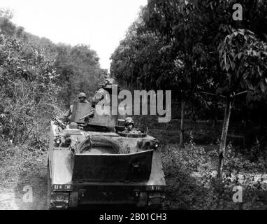 Vietnam: US Army M113 armoured personnel carriers and M4SA3 tanks deploy between jungle and a rubber plantation in the 'Iron Triangle' north of Saigon, Operation Cedar Falls, January 1967.  The Second Indochina War, known in America as the Vietnam War, was a Cold War era military conflict that occurred in Vietnam, Laos, and Cambodia from 1 November 1955 to the fall of Saigon on 30 April 1975. This war followed the First Indochina War and was fought between North Vietnam, supported by its communist allies, and the government of South Vietnam, supported by the U.S. Stock Photo