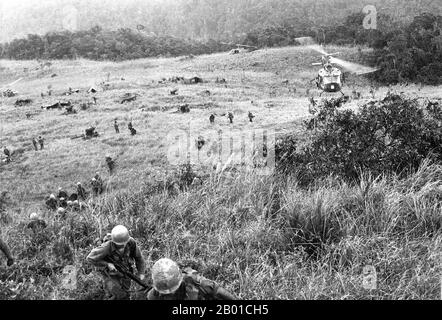 Vietnam: US Army troops of the 1st Cavalry Division deploy at an LZ ('Landing Zone') in the Central Highlands, Operation Crazy Horse, 1966.  The Second Indochina War, known in America as the Vietnam War, was a Cold War era military conflict that occurred in Vietnam, Laos, and Cambodia from 1 November 1955 to the fall of Saigon on 30 April 1975. This war followed the First Indochina War and was fought between North Vietnam, supported by its communist allies, and the government of South Vietnam, supported by the U.S. and other anti-communist nations. Stock Photo