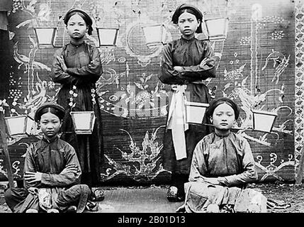 Vietnam: A group of four dancers, Tonkin, c. 1905.  Ca trù, also known as hát cô đầu or hát nói, is a genre of musical storytelling from northern Vietnam, performed by a featuring female vocalist. It combined entertaining wealthy clients with performing religious songs for the royal court.  Traditional Vietnamese dance includes several different forms. These include: dance as performed in Vietnamese theatre and opera, dances performed at festivals, and royal dances of the imperial court. Dance is thought to have been an integral part of Vietnamese culture since ancient times. Stock Photo