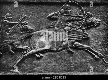 Iraq: King Ashurbanipal (685-627 BCE) hunting in a palace relief from Nineveh, c. 640 BCE.  Ashurbanipal, also spelt Assurbanipal or Ashshurbanipal, was an Assyrian king, the son of Esarhaddon and the last great king of the Neo-Assyrian Empire (r. 668-627 BCE). He established the first systematically organised library in the ancient Middle East, the Library of Ashurbanipal, which survives in part today at Nineveh.  In the Bible he is called Asenappar (Ezra 4:10). Roman historian Justinus identified him as Sardanapalus. Stock Photo