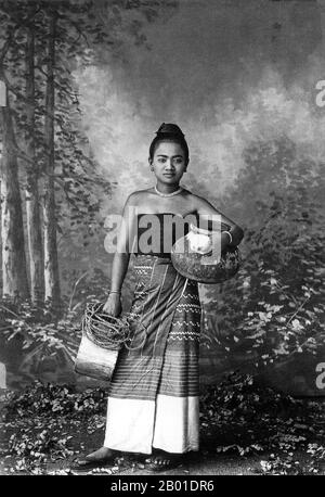 Burma/Myanmar: Studio portrait representing a supposed village beauty returning from the well. Photo by Felice Beato (1832 - 29 January 1909), c. 1895.  Felice Beato, also known as Felix Beato, was an Italian-British photographer. He was one of the first people to take photographs in East Asia and one of the first war photographers.  He is noted for his genre works, portraits, and views and panoramas of the architecture and landscapes of Asia and the Mediterranean region. Beato's travels gave him the opportunity to create images of countries, people and events that were unfamiliar to the West. Stock Photo