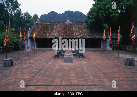 Vietnam: Emperor Le Dai Hanh Temple (Le Hoan), Hoa Lu, Ninh Binh Province.  The Den Emperor Le Dai Hanh temple is dedicated to the founder of the Early Le Dynasty (980-1005), a patriot who defeated a Chinese invasion in 981. He also replaced Chinese currency with Vietnamese coinage and took steps to begin the conquest of Champa to the south, forcing the Cham king to pay tribute and carrying back the Cham royal ballet to perform at Hoa Lu.  Lê Hoàn (941-1005), posthumous name Lê Đại Hành, was a king and emperor of Đại Cồ Việt (Vietnam) under the Anterior Lê Dynasty. Stock Photo