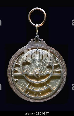 Spain/Al-andalus: A brass astrolabe made by Muhammad al-Naqqhash of Zaragoza, 1080 CE. Photo by Wolfgang Sauber (CC BY-SA 3.0 License).  An astrolabe (Greek: astrolabon, 'star-taker') is an elaborate inclinometer, historically used by astronomers, navigators, and astrologers. Its many uses include locating and predicting the positions of the Sun, Moon, planets, and stars, determining local time given local latitude and vice-versa, surveying, triangulation, and to cast horoscopes.  It was used in classical antiquity, through the Islamic Golden Age, the European Middle Ages and the Renaissance. Stock Photo