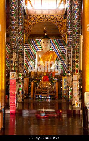 Thailand: Buddha within the viharn at Wat Nong Kham (Pa O temple), Chiang Mai.  The Pa-Oh, also known as Taungthu and Black Karen, are an ethnic group in Burma, comprising approximately 600,000. They form the second largest ethnic group in Shan State, and are believed to be of Tibeto-Burman stock. They are ethnolinguistically related to the Karen and populate Shan State, Kayin State and Kayah State.  King Mengrai founded the city of Chiang Mai (meaning 'new city') in 1296 and it succeeded Chiang Rai as capital of the Lanna kingdom. Chiang Mai is sometimes written as 'Chiengmai' or 'Chiangmai'. Stock Photo