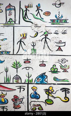 Naxo Script China: Dongba (Naxi) pictographic script adorns a house in the Old Town ...