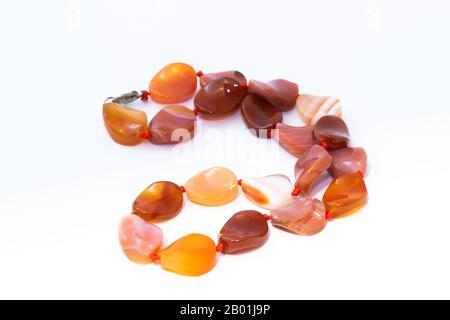 Brown agate beads isolated on white background Stock Photo