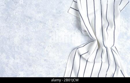 striped kitchen towel, isolated on white background Stock Photo