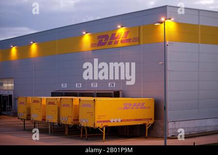 DHL distribution center in the evening, Germany, North Rhine-Westphalia, Rheinsberg Stock Photo
