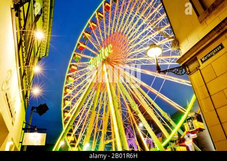 All Hallows funfair with illuminated ferris wheel in the old city, Germany, North Rhine-Westphalia, Soest Stock Photo