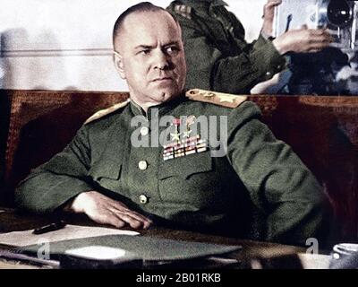 Russia: Marshal Georgy Zhukov (19 November 1896 - 18 June 1974), victor of Khalkin Gol (1938), signing the German surrender in Berlin, 2 May 1945.  Marshal of the Soviet Union Georgy Konstantinovich Zhukov was a Russian career officer in the Red Army who, in the course of World War II, played a pivotal role in leading the Red Army through much of Eastern Europe to liberate the Soviet Union and other nations from the Axis Powers' occupation and conquer Germany's capital, Berlin. He is the most decorated general in the history of Russia and the Soviet Union. Stock Photo
