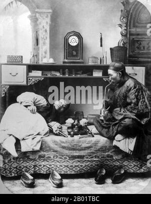 China: Opium smokers in a Shanghai studio, c. 1865.  Opium poppy, Papaver somniferum, is the species of plant from which opium and poppy seeds are extracted. Opium is the source of many opiates, including morphine, thebaine, codeine, papaverine and noscapine. The Latin botanical name means the 'sleep-bringing poppy', referring to the sedative properties of some of these opiates. Stock Photo