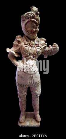 China: A tomb guard (wushi yong), terracotta sculpture, Tang Dynasty, early 8th century. Photo by Guillaume Jacquet (CC BY-SA 3.0 License).  The Tang Dynasty (18 June 618 - 1 June 907) was an imperial dynasty of China preceded by the Sui Dynasty and followed by the Five Dynasties and Ten Kingdoms Period. It was founded by the Li (李) family, who seized power during the decline and collapse of the Sui Empire. The dynasty was interrupted briefly by the Second Zhou Dynasty (8 October 690 - 3 March 705) when Empress Wu Zetian seized the throne, becoming the first and only Chinese empress regnant. Stock Photo