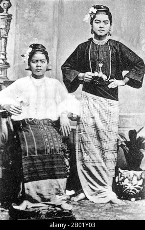 Burma/Myanmar: The celebrated ah-nyeint Sein Chit (right) with her sister, c. 1910. They are both wearing everyday clothing.  Dance in Burma can be divided into dramatic, folk and village, and nat dances, each having distinct characteristics. Although Burmese dance has been influenced by the dance traditions of its neighbours, in particular Thailand, it retains unique qualities that distinguish it from other regional styles, including angular, fast-paced and energetic movements and emphasis on pose, not movement.  Various types of Burmese music use an array of traditional musical instruments. Stock Photo