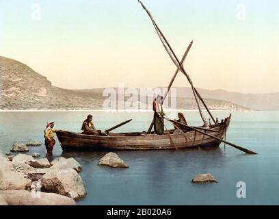 Palestine: Palestinian men fishing from a boat on the Sea of Galilee (Lake Tiberias). Photo by Félix Bonfils, c. 1880.  Palestine is a name given to the geographic region between the Mediterranean Sea and the Jordan River. The region is also known as the Land of Israel (Eretz-Yisra'el), the Holy Land and the Southern Levant.  In 1832 Palestine was conquered by Muhammad Ali's Egypt, but in 1840 Britain intervened and returned control of the Levant to the Ottomans in return for further capitulations. The end of the 19th century saw the beginning of Zionist immigration and the revival of Hebrew. Stock Photo