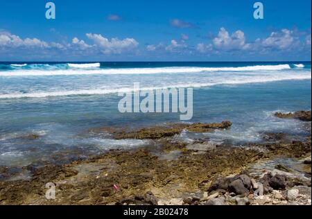 Maldives: Waves break on the coral reef which is very close to the ...