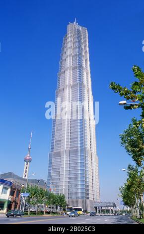 The Jin Mao Tower, at 421m (1,381ft) was until 2007 the highest building in China. Its postmodern form, whose complexity rises as it ascends, draws on traditional Chinese architecture such as the tiered pagoda, gently stepping back to create a rhythmic pattern as it rises.  Shanghai began life as a fishing village, and later as a port receiving goods carried down the Yangzi River. From 1842 onwards, in the aftermath of the first Opium War, the British opened a ‘concession’ in Shanghai where drug dealers and other traders could operate undisturbed. French, Italians, Germans, Americans and Japan Stock Photo