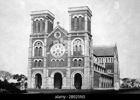 Saigon Notre-Dame Basilica, officially Basilica of Our Lady of The Immaculate Conception is a cathedral located in Ho Chi Minh City (Saigon). Established by French colonists, the cathedral was constructed between 1863 and 1880. It has two bell towers, reaching a height of 58 meters (190 feet).  Former Emperor Bảo Đại made Saigon the capital of the State of Vietnam in 1949 with himself as head of state. After the Việt Minh gained control of North Vietnam in 1954, it became common to refer to the Saigon government as 'South Vietnam'.  The government was renamed the Republic of Vietnam when Bảo Đ Stock Photo