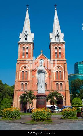 Saigon Notre-Dame Basilica, officially Basilica of Our Lady of The Immaculate Conception is a cathedral located in Ho Chi Minh City (Saigon). Established by French colonists, the cathedral was constructed between 1863 and 1880. It has two bell towers, reaching a height of 58 meters (190 feet).  Former Emperor Bảo Đại made Saigon the capital of the State of Vietnam in 1949 with himself as head of state. After the Việt Minh gained control of North Vietnam in 1954, it became common to refer to the Saigon government as 'South Vietnam'.  The government was renamed the Republic of Vietnam when Bảo Đ Stock Photo