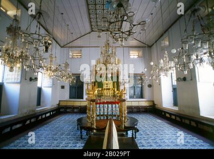 The Paradesi Synagogue (also known as the Cochin Jewish Synagogue or the Mattancherry Synagogue) is the oldest active synagogue in India and also the Commonwealth of Nations. Constructed in 1568, it is one of seven synagogues of the Malabar Yehudan people or Cochin Jewish community. The Paradesi is the only synagogue still active of the original seven.  The Malabari Jews (also known as Cochin Jews) formed a prosperous trading community of Kerala, and they controlled a major portion of the world wide spice trade. In 1568, the Jews of Kerala constructed the Paradesi Synagogue adjacent to the Mat Stock Photo