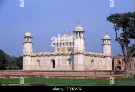 India: The tomb of I'timad-ud-Daulah, Agra. Etimad-ud-Daula's Tomb is a Mughal mausoleum in the city of Agra in the Indian state of Uttar Pradesh.  Along with the main building, the structure consists of numerous outbuildings and gardens. The tomb, built between 1622 and 1628 represents a transition between the first phase of monumental Mughal architecture - primarily built from red sandstone with marble decorations, as in Humayun's Tomb in Delhi and Akbar's tomb in Sikandra - to its second phase, based on white marble and pietra dura inlay, most elegantly realized in the Taj Mahal. Stock Photo