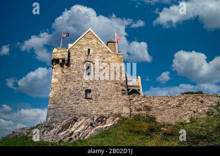 Stone castle on the hilltop in the village of Baltimore, County Cork, Ireland. Stock Photo