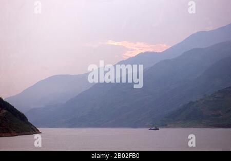 The Three Gorges or Yangtze Gorges span from the western—upriver cities of Fengjie and Yichang in Chongqing Municipality eastward—downstream to Hubei province.  The Yangtze River (Chang Jiang)—Three Gorges region has a total length of approximately 200 kilometres (120 mi). The Three Gorges occupy approximately 120 kilometres (75 mi) within this region.   The Chang Jiang (Yangzi River) is the longest river in China and third longest in the world. Known upstream as the Golden Sand River, it flows through the geographical, spiritual and historical heart of China.  From its source in the Tanggula Stock Photo