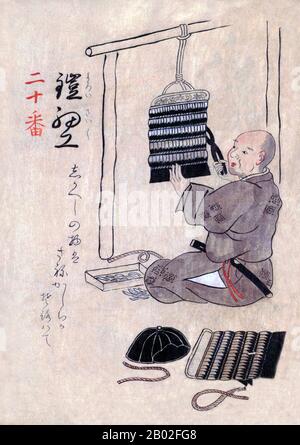 Japan: Traditional crafts and trades of the 18th century from a hand-painted album by an anonymous artist. Folio 20 (recto): Making leather armour. Hand-coloured illustration from a Japanese miscellany on traditional trades, crafts and customs in mid-18th century Japan, dated Meiwa Era (1764-1772) Year 6 (c. 1770 CE). Stock Photo