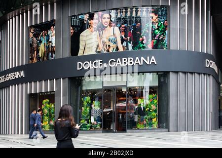 High end luxury Dolce & Gabbana lifestyle boutique branded store at Orchard ION, people walking on street, Orchard Road. Singapore Stock Photo