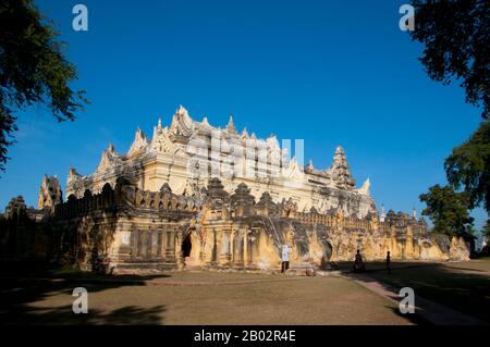 The Maha Aung Mye Bonzan Monastery was built in 1822 by Nanmadaw Me Nu, the first queen of King Bagyidaw (1784 - 1846).  Inwa was the capital of Burma for nearly 360 years, on five separate occasions, from 1365 to 1842. So identified as the seat of power in Burma that Inwa (as the Kingdom of Ava, or the Court of Ava) was the name by which Burma was known to Europeans down to the 19th century. Stock Photo