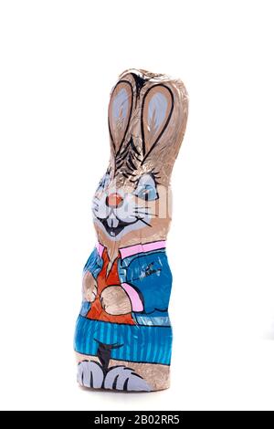 Chocolate Easter bunny on an isolated white background, male figure, Easter candy, specially for children, egg hunt Stock Photo