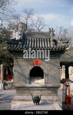 Beijing Dongyue Temple, literally Beijing Eastern Peak Temple, was built between 1314 and 1320, when it was one of the largest Taoist temples in Beijing. The complex has three courtyards. In the centre of the Hall of Taishan Mountain are statues of the God of Taishan Mountain and his high-ranking attendants. Corridors house 72 statues of deities, called 'chiefs of departments', some handing out harsh punishments to people who have done bad things.  Dongyue Temple was burned down during a battle in the Yuan dynasty (1271 - 1368) and was rebuilt during the Ming dynasty (1368 - 1644). The current Stock Photo