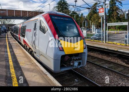 Greater Anglia Stadler Class 755/4 train at Whittlesford Station in South Cambridgeshire. Train is a bi-mode multiple unit Stadler Flirt type train. Stock Photo