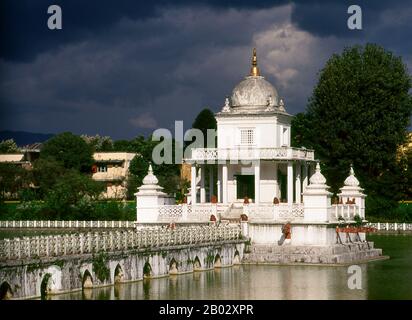 Rani Pokhari (Queen’s Pond), located off the northern end of the Tundikhel, is one of Kathmandu’s more attractive landmarks. The pond was dug between 1665 and 1670 by King Pratapa Malla to comfort his wife Bhavan Lakshmi over the death of their son Chakrabatindra Malla who had been trampled to death by an elephant.  In later years, the pond was used for trial by ordeal, in which the representatives of two conflicting parties had to submerge themselves in the water, the one with the greater lung capacity winning the case. With the beginning of Rana rule the ordeals were discontinued. Stock Photo