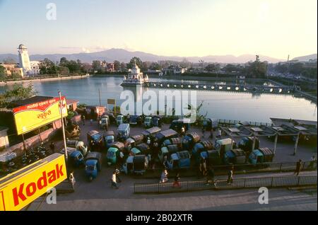 Rani Pokhari (Queen’s Pond), located off the northern end of the Tundikhel, is one of Kathmandu’s more attractive landmarks. The pond was dug between 1665 and 1670 by King Pratapa Malla to comfort his wife Bhavan Lakshmi over the death of their son Chakrabatindra Malla who had been trampled to death by an elephant.  In later years, the pond was used for trial by ordeal, in which the representatives of two conflicting parties had to submerge themselves in the water, the one with the greater lung capacity winning the case. With the beginning of Rana rule the ordeals were discontinued. Stock Photo