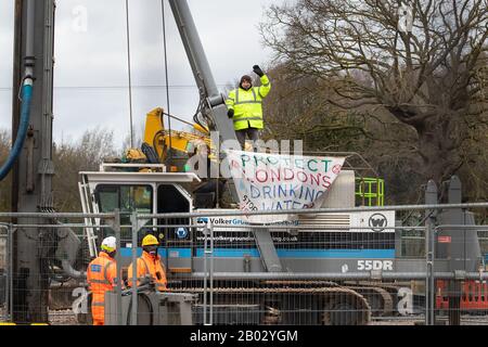 RETRANSMITTED CORRECTING CAPTION Partially sighted Paralympian James Brown (right) joins climate activists who has occupied a drilling rig in the HS2 compound off the Harvil Road in the Colne Valley park, near Uxbridge. Stock Photo