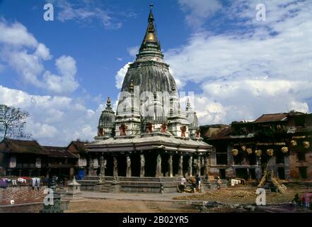 Machhendranath is a Hindu deity, the protector of the Kathmandu Valley and the master over rain and prosperity.  The Rato Machhendranath Temple is one of the more sacred sites in Bungamati, and is dedicated to a deity of many personalities and names, Padmapani Avalokiteshvara. Buddhists worship him under the name of Rato Machhendranath or Bungadyo (The One from Bungamati), and Hindus regard him as another manifestation of their multi-facetted god Shiva.  However Buddhists and Hindus alike consider Rato Machhendranath to be the god of rain and plenty, after an incident when he is said to have i Stock Photo