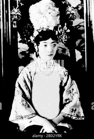 Gobulo Wan Rong ('Beautiful Countenance') was the daughter of Rong Yuan, the Minister of Domestic Affairs of the Qing Government and head of one of Manchuria's most prominent, richest families. At the age of 17, Wan Rong was selected from a series of photographs presented to the Xuan Tong Emperor (Puyi). The wedding took place when Puyi reached the age of 16.  Wan Rong was the last Empress Consort of the Qing Dynasty in China, and later Empress of Manchukuo (also known as the Manchurian Empire). Empress Wan Rong died of malnutrition and opium addiction in prison in Jilin. Stock Photo