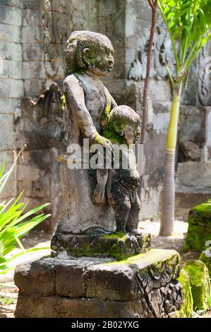 Pura Meduwe Karang is a Hindu temple at Kubutambahan approximately 12 km east of Singaraja in northern Bali.  The temple built in 1890 is dedicated to Batara Meduwe Karang (God of the land). The temple provides divine protection of crops and fertile soil. At the entrance are three rows of Ramayana images. The temple is walled and adorned with columns. There are two split gates and some pavilions. Stock Photo