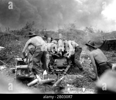 The Battle of Balikpapan was the concluding stage of Operation Oboe. The landings took place on 1 July 1945. The Australian 7th Division, composed of the 18th, 21st and 25th Infantry Brigades, with Dutch East Indies troops, made an amphibious landing a few miles north of Balikpapan, on the island of Borneo. The landing had been preceded by heavy bombing and shelling by Australian and US air and naval forces. The Japanese were outnumbered and outgunned, but like the other battles of the Pacific War, many of them fought to the death.  Major operations had ceased by July 21. The 7th Division's ca Stock Photo