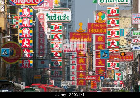 Thailand: Traffic and signs on Yaowarat Road, Chinatown, Bangkok (2008). Bangkok's Chinatown is one of the largest Chinatowns in the world. It was founded in 1782 when the city was established as the capital of the Rattanakosin Kingdom, and served as the home of the mainly Teochew immigrant Chinese population, who soon became the city's dominant ethnic group. Stock Photo