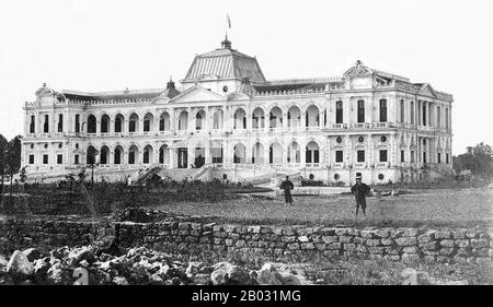 In 1858, France launched an attack on Đà Nẵng, starting its invasion of Vietnam. In 1867, France completed its conquest of southern Vietnam (Cochinchina), comprising the provinces of Biên Hoà, Gia Định, Định Tường, Vĩnh Long, An Giang, and Hà Tiên. To consolidate the newly established colony, on 23 February 1868, Lagrandière, Governor of Cochinchina, held a ceremony to lay the foundation stone of a new palace to replace the old wooden palace built in 1863.   The new palace was designed by Hermite, who was also the architect of the Hong Kong City Hall. The first cubic stone, measuring 50 cm alo Stock Photo