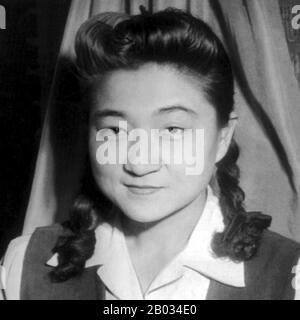 Iva Ikuko Toguri D'Aquino (July 4, 1916 – September 26, 2006) was an American who participated in English-language propaganda broadcast transmitted by Radio Tokyo to Allied soldiers in the South Pacific during World War II.  After the Japanese defeat, Toguri was charged by the United States Attorney's Office with treason. Her 1949 trial resulted in a conviction, for which she spent more than six years of a ten-year sentence in prison.   Toguri received a pardon in 1977 from U.S. President Gerald Ford. Stock Photo