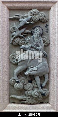 Malaysia / China: Carving of Laozi, founder of Taoism, depicting his role in the 16th Century Ming Dynasty novel Fengshen Yanyi ('Investiture of the Gods'). From Ping Sien Si Temple, Pasir Panjang Laut. Photo by Anandajoti (CC BY 2.0). Laozi, also known by Lao-Tzu or Lao-Tze, was an ancient Chinese philosopher and writer, and is renowned as the author of the 'Tao Te Ching' and being the founder of philosophical Taoism. Laozi is usually believed to have lived in the 6th century BCE, being a contemporary of Confucius, though some scholars place him later during the Warring States period. Stock Photo