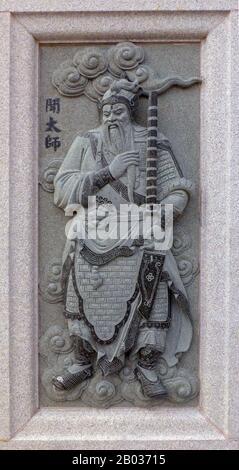 China: Carving of Wen Taishi (Wen Zhong of Shang), depicting his role in the 16th Century Ming Dynasty novel Fengshen Yanyi ('Investiture of the Gods'). From Ping Sien Si Temple, Pasir Panjang Laut. Photo by Anandajoti (CC BY 2.0). Wen Zhong, also known as Grand Tutor Wen, was a character from the classic Ming Dynasty novel 'Fengshen Yanyi'. Wen Zhong was one of the highest ranked officials in the Shang Dynasty, having served under King Da Yi for many years. When King Da Yi died, Wen Zhong crowned Da Yi's son Zi Shou (King Zhou of Shang) as the new monarch of the Shang Dynasty. Stock Photo