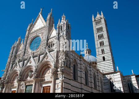 The Cathedral of Saint Mary of the Assumption was originally designed and completed between 1215 and 1263 on the site of an earlier structure. It has the form of a Latin cross with a slightly projecting transept, a dome and a bell tower.  The dome rises from a hexagonal base with supporting columns. The lantern atop the dome was added by Gian Lorenzo Bernini. The nave is separated from the two aisles by semicircular arches. The exterior and interior are constructed of white and greenish-black marble in alternating stripes, with addition of red marble on the façade. Stock Photo