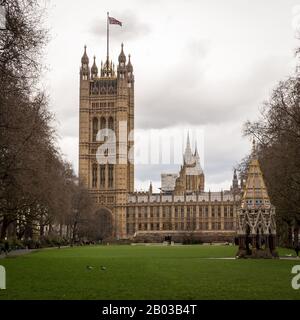 Palace of Westminster, London. A view from Victoria Tower Gardens looking towards The Houses of Parliament, the seat of UK politics and government. Stock Photo