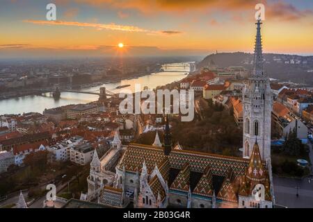 Budapest, Hungary - Beautiful aerial sunrise with Matthias Church, Fisherman's Bastion, Szechenyi Chain Bridge and Buda Castle Royal Palace at winter Stock Photo