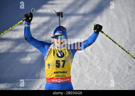 Antholz, Italy. 18th Aug, 2017. Biathlon: World Championship, 15 km singles, women. Dorothea Wierer from Italy cheers at the finish. Credit: Hendrik Schmidt/dpa/Alamy Live News Stock Photo